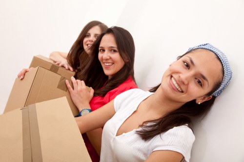 Professional moving team loading furniture for a St Johns Wood relocation