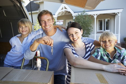 Local removalists in Stjohnswood organizing moving boxes for delivery