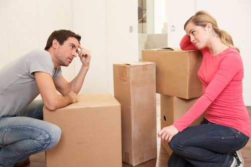 Professional movers preparing boxes for fast relocation in St Johns Wood