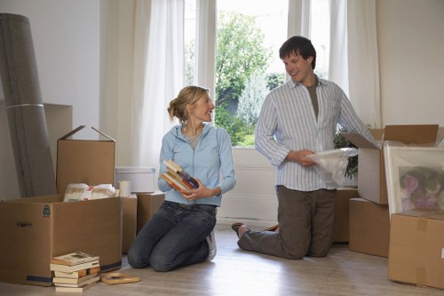 Furniture and boxes being moved by a local removals team