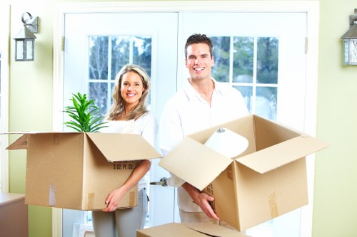 Professional movers loading furniture for a St Johns Wood removal